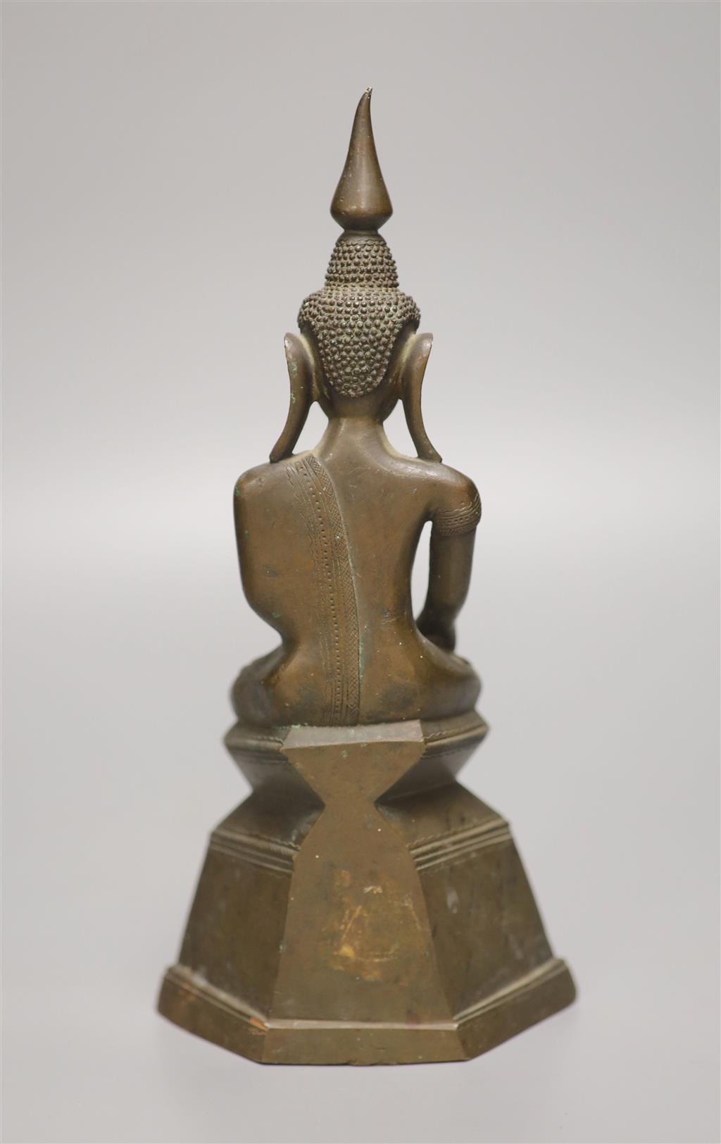 A 19th century Burmese bronze Buddha, height 24cm